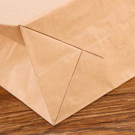 Τυπωμένο συνήθεια της Kraft εγγράφου σχοινί χεριών τσαντών φιλικό προς το περιβάλλον επίπεδο προμηθευτής